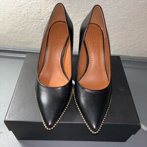 Coach leather pumps. Never worn, with originally packaging. 3 inch heel. Size:7